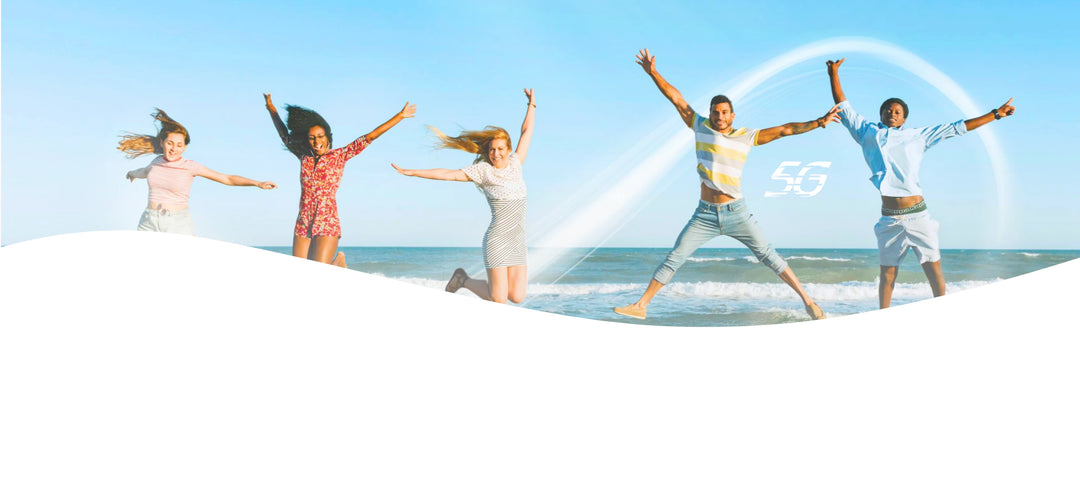 People playing in water with 5G connection of AloOui eSIM on a beach